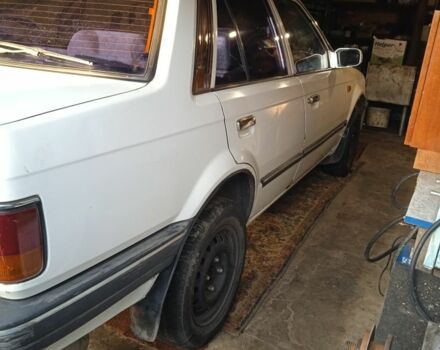 Белый Мазда 3, объемом двигателя 1.5 л и пробегом 333 тыс. км за 473 $, фото 2 на Automoto.ua