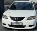 Белый Мазда 3, объемом двигателя 2 л и пробегом 213 тыс. км за 3500 $, фото 1 на Automoto.ua