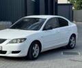 Белый Мазда 3, объемом двигателя 2 л и пробегом 213 тыс. км за 3500 $, фото 1 на Automoto.ua