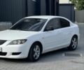 Белый Мазда 3, объемом двигателя 2 л и пробегом 212 тыс. км за 3500 $, фото 1 на Automoto.ua