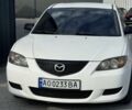 Белый Мазда 3, объемом двигателя 2 л и пробегом 212 тыс. км за 3500 $, фото 1 на Automoto.ua