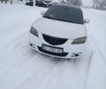 Белый Мазда 3, объемом двигателя 1.6 л и пробегом 235 тыс. км за 4800 $, фото 1 на Automoto.ua