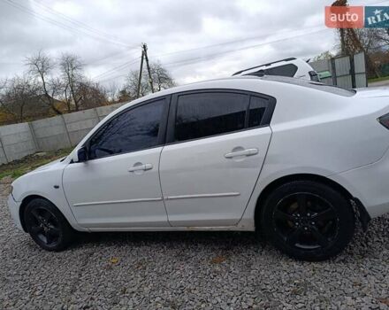 Білий Мазда 3, об'ємом двигуна 1.6 л та пробігом 235 тис. км за 5000 $, фото 2 на Automoto.ua