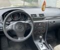 Білий Мазда 3, об'ємом двигуна 2 л та пробігом 181 тис. км за 4200 $, фото 4 на Automoto.ua