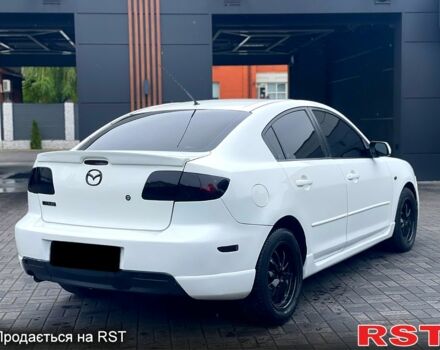 Білий Мазда 3, об'ємом двигуна 2 л та пробігом 182 тис. км за 4900 $, фото 3 на Automoto.ua