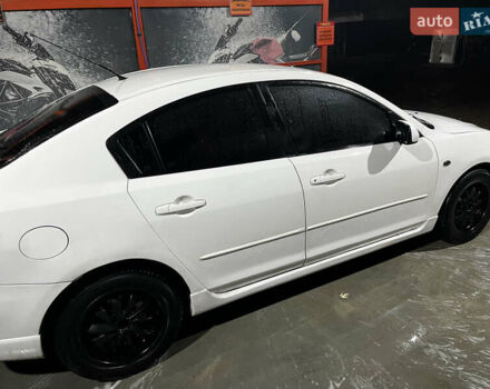 Белый Мазда 3, объемом двигателя 2 л и пробегом 295 тыс. км за 4500 $, фото 4 на Automoto.ua