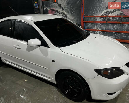 Белый Мазда 3, объемом двигателя 2 л и пробегом 295 тыс. км за 4500 $, фото 1 на Automoto.ua