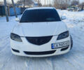 Белый Мазда 3, объемом двигателя 2 л и пробегом 200 тыс. км за 4500 $, фото 2 на Automoto.ua