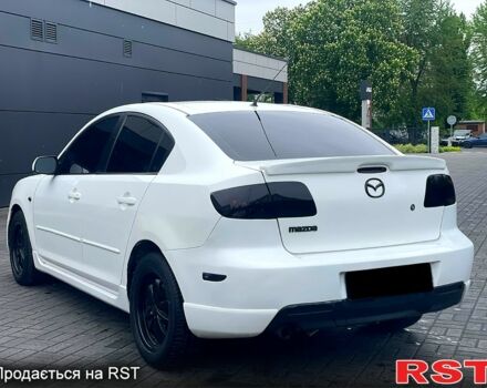 Білий Мазда 3, об'ємом двигуна 2 л та пробігом 182 тис. км за 4900 $, фото 4 на Automoto.ua