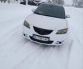 Білий Мазда 3, об'ємом двигуна 1.6 л та пробігом 235 тис. км за 4500 $, фото 1 на Automoto.ua