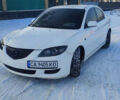 Белый Мазда 3, объемом двигателя 2 л и пробегом 200 тыс. км за 4500 $, фото 1 на Automoto.ua
