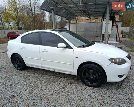 Білий Мазда 3, об'ємом двигуна 1.6 л та пробігом 235 тис. км за 5000 $, фото 3 на Automoto.ua