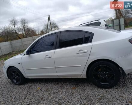 Білий Мазда 3, об'ємом двигуна 1.6 л та пробігом 235 тис. км за 4500 $, фото 2 на Automoto.ua