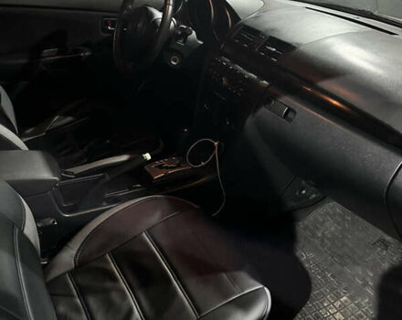 Белый Мазда 3, объемом двигателя 2 л и пробегом 295 тыс. км за 4500 $, фото 19 на Automoto.ua