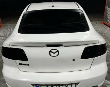Белый Мазда 3, объемом двигателя 2 л и пробегом 295 тыс. км за 4500 $, фото 12 на Automoto.ua