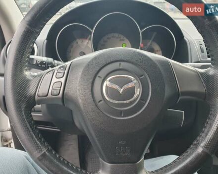 Білий Мазда 3, об'ємом двигуна 1.6 л та пробігом 120 тис. км за 5700 $, фото 30 на Automoto.ua