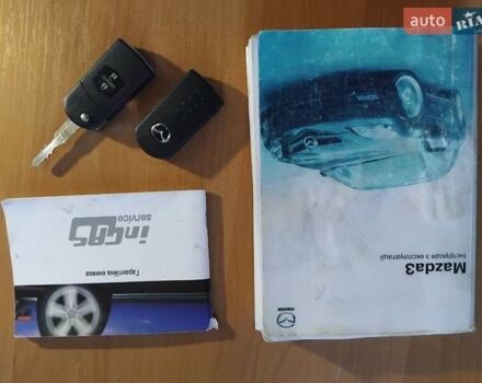 Білий Мазда 3, об'ємом двигуна 1.6 л та пробігом 190 тис. км за 6100 $, фото 17 на Automoto.ua