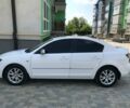 Белый Мазда 3, объемом двигателя 1 л и пробегом 133 тыс. км за 7000 $, фото 3 на Automoto.ua
