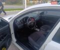 Белый Мазда 3, объемом двигателя 2 л и пробегом 285 тыс. км за 5900 $, фото 2 на Automoto.ua