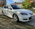 Белый Мазда 3, объемом двигателя 2 л и пробегом 180 тыс. км за 6200 $, фото 1 на Automoto.ua