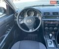 Белый Мазда 3, объемом двигателя 1.6 л и пробегом 187 тыс. км за 5600 $, фото 1 на Automoto.ua