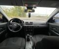Белый Мазда 3, объемом двигателя 2 л и пробегом 182 тыс. км за 7100 $, фото 4 на Automoto.ua