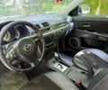 Белый Мазда 3, объемом двигателя 2 л и пробегом 152 тыс. км за 6000 $, фото 5 на Automoto.ua