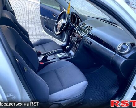 Белый Мазда 3, объемом двигателя 1.6 л и пробегом 215 тыс. км за 5650 $, фото 8 на Automoto.ua