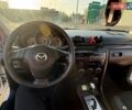 Белый Мазда 3, объемом двигателя 1.6 л и пробегом 214 тыс. км за 5700 $, фото 1 на Automoto.ua