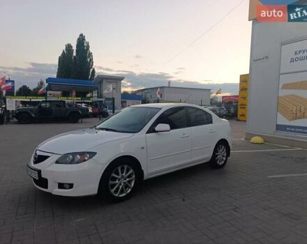 Белый Мазда 3, объемом двигателя 2 л и пробегом 285 тыс. км за 5900 $, фото 1 на Automoto.ua