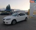 Белый Мазда 3, объемом двигателя 2 л и пробегом 285 тыс. км за 5900 $, фото 1 на Automoto.ua
