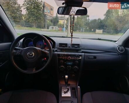Белый Мазда 3, объемом двигателя 2 л и пробегом 285 тыс. км за 5900 $, фото 5 на Automoto.ua