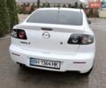 Білий Мазда 3, об'ємом двигуна 1.6 л та пробігом 235 тис. км за 4999 $, фото 3 на Automoto.ua