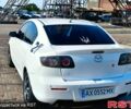 Білий Мазда 3, об'ємом двигуна 1.6 л та пробігом 215 тис. км за 5700 $, фото 1 на Automoto.ua