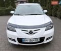 Білий Мазда 3, об'ємом двигуна 1.6 л та пробігом 235 тис. км за 4999 $, фото 1 на Automoto.ua