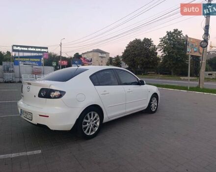 Белый Мазда 3, объемом двигателя 2 л и пробегом 285 тыс. км за 5900 $, фото 4 на Automoto.ua