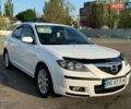 Белый Мазда 3, объемом двигателя 1.6 л и пробегом 214 тыс. км за 5700 $, фото 1 на Automoto.ua