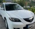 Белый Мазда 3, объемом двигателя 2 л и пробегом 225 тыс. км за 4000 $, фото 2 на Automoto.ua