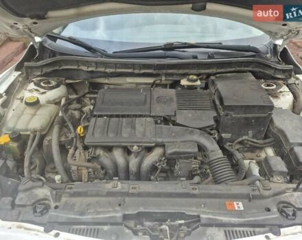 Белый Мазда 3, объемом двигателя 1.6 л и пробегом 205 тыс. км за 7000 $, фото 6 на Automoto.ua