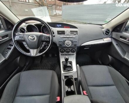 Білий Мазда 3, об'ємом двигуна 1.6 л та пробігом 130 тис. км за 7790 $, фото 17 на Automoto.ua