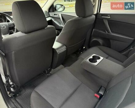 Білий Мазда 3, об'ємом двигуна 1.6 л та пробігом 170 тис. км за 9200 $, фото 18 на Automoto.ua