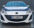 Белый Мазда 3, объемом двигателя 2 л и пробегом 137 тыс. км за 6499 $, фото 2 на Automoto.ua