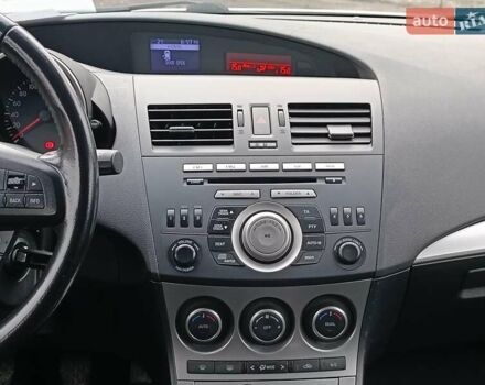 Білий Мазда 3, об'ємом двигуна 1.6 л та пробігом 130 тис. км за 7790 $, фото 15 на Automoto.ua