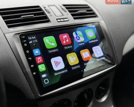 Білий Мазда 3, об'ємом двигуна 1.6 л та пробігом 170 тис. км за 9200 $, фото 23 на Automoto.ua