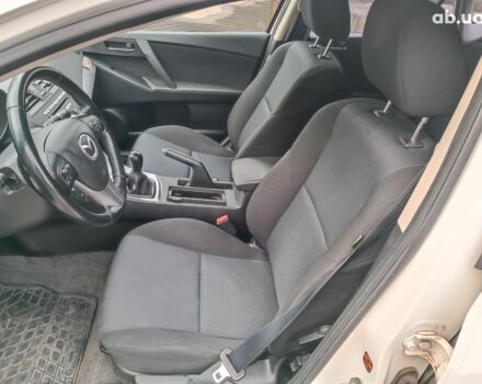 Білий Мазда 3, об'ємом двигуна 1.6 л та пробігом 130 тис. км за 7790 $, фото 19 на Automoto.ua