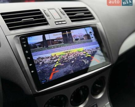 Білий Мазда 3, об'ємом двигуна 1.6 л та пробігом 170 тис. км за 9200 $, фото 24 на Automoto.ua