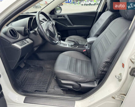 Белый Мазда 3, объемом двигателя 1.6 л и пробегом 180 тыс. км за 9350 $, фото 47 на Automoto.ua