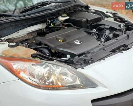 Белый Мазда 3, объемом двигателя 2 л и пробегом 200 тыс. км за 7900 $, фото 22 на Automoto.ua