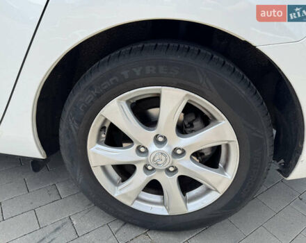 Белый Мазда 3, объемом двигателя 1.6 л и пробегом 180 тыс. км за 9350 $, фото 31 на Automoto.ua