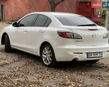 Белый Мазда 3, объемом двигателя 2 л и пробегом 200 тыс. км за 7900 $, фото 6 на Automoto.ua
